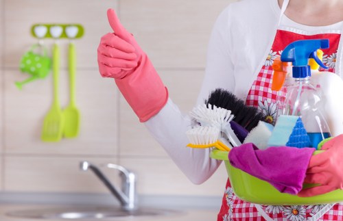 Professional cleaner working on central London windows in Soho