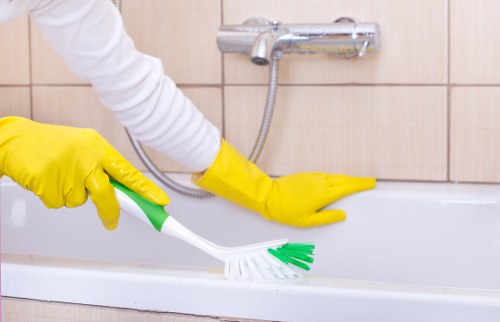 Cleaner checking access and work area before starting service