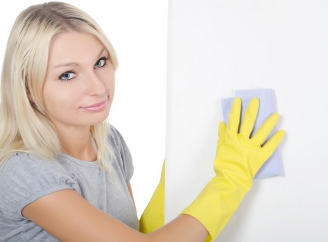 Cleaner reviewing booking details for a scheduled cleaning service